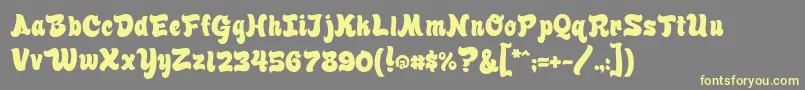 Finkbrush Font – Yellow Fonts on Gray Background