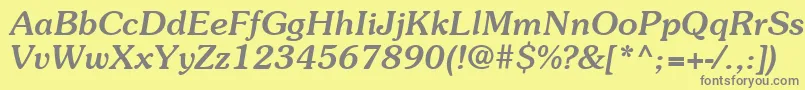フォントItcSouvenirLtMediumItalic – 黄色の背景に灰色の文字