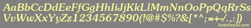 フォントItcSouvenirLtMediumItalic – 黄色のフォント、灰色の背景
