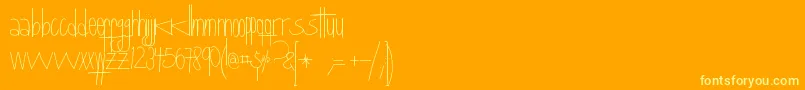 Queretaro-Schriftart – Gelbe Schriften auf orangefarbenem Hintergrund