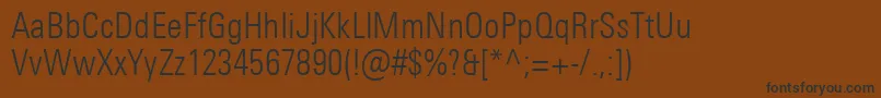Czcionka UniversNextProLightCondensed – czarne czcionki na brązowym tle