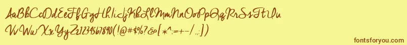 BmdCheddarJack Font – Brown Fonts on Yellow Background