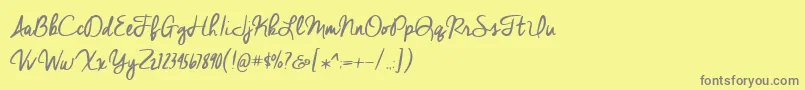 BmdCheddarJack Font – Gray Fonts on Yellow Background
