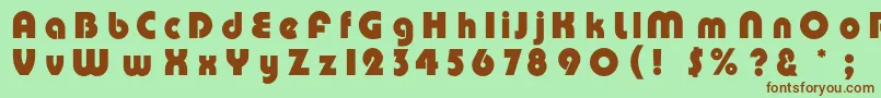 Pumpc Font – Brown Fonts on Green Background