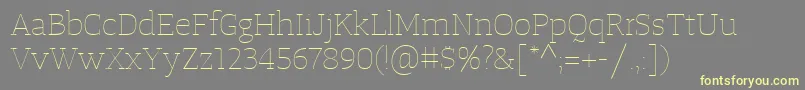 Шрифт TangerserifwideUltralight – жёлтые шрифты на сером фоне