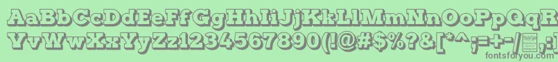 Fonte TyposterOutlineDemo – fontes cinzas em um fundo verde