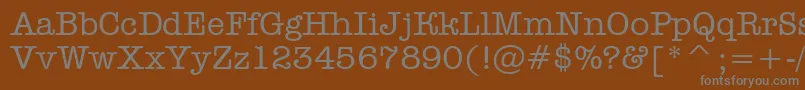 AOldtyper-Schriftart – Graue Schriften auf braunem Hintergrund