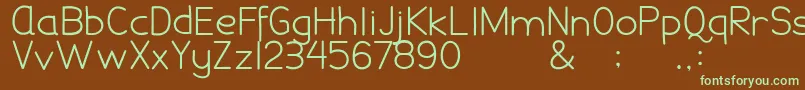 フォントDamaiPelajar – 緑色の文字が茶色の背景にあります。
