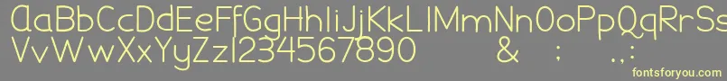 DamaiPelajar-fontti – keltaiset fontit harmaalla taustalla