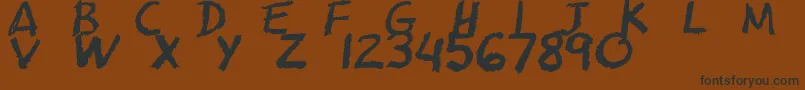 フォントCfschoolzoneregular – 黒い文字が茶色の背景にあります