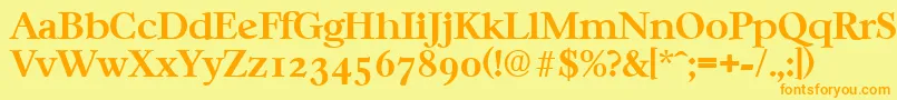 フォントCasablancaSerialBoldDb – オレンジの文字が黄色の背景にあります。