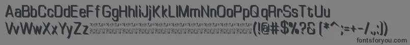 Czcionka TinyplateBoldDemo – czarne czcionki na szarym tle