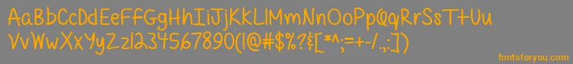 QuirkyMessy Font – Orange Fonts on Gray Background