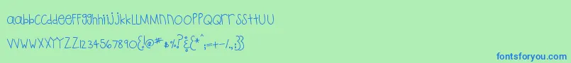 MtfPlaytime-Schriftart – Blaue Schriften auf grünem Hintergrund