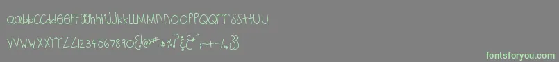 MtfPlaytime-Schriftart – Grüne Schriften auf grauem Hintergrund