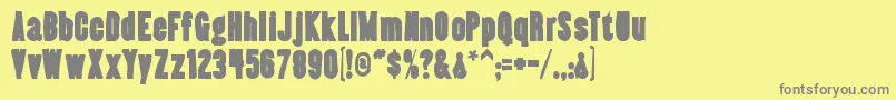 Almonteink Font – Gray Fonts on Yellow Background