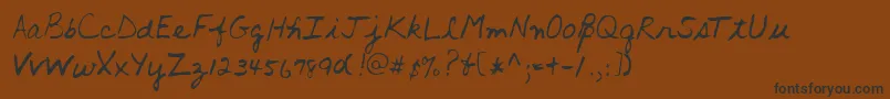 フォントLehn016 – 黒い文字が茶色の背景にあります