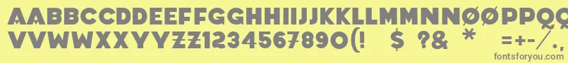 フォントCoradium – 黄色の背景に灰色の文字