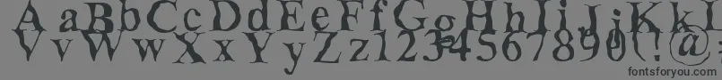 Decomposing Font – Black Fonts on Gray Background