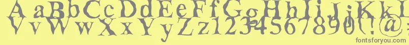 Decomposing Font – Gray Fonts on Yellow Background