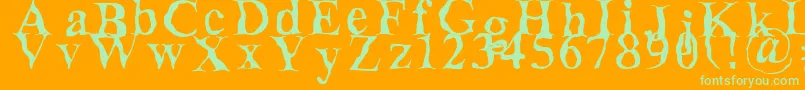 Decomposing Font – Green Fonts on Orange Background