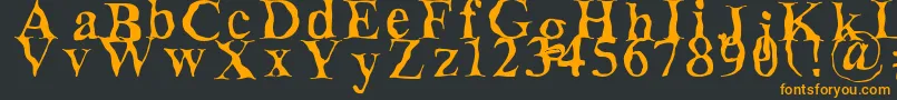 フォントDecomposing – 黒い背景にオレンジの文字