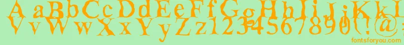 フォントDecomposing – オレンジの文字が緑の背景にあります。