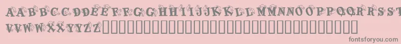 Fonte KrKaboomerang – fontes cinzas em um fundo rosa