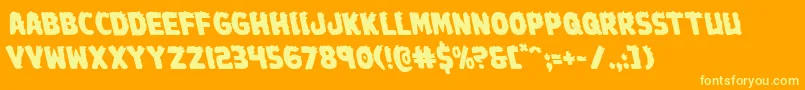フォントJohnnytorchleft – オレンジの背景に黄色の文字