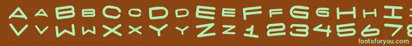 7 Days Fat Rotated Font – Green Fonts on Brown Background
