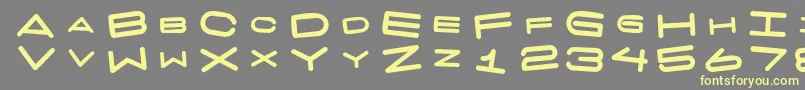 7 Days Fat Rotated Font – Yellow Fonts on Gray Background