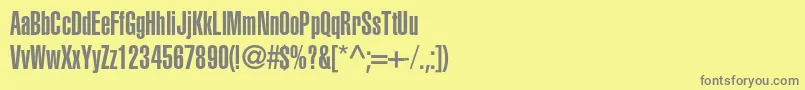 フォントHelveticaltstdUltracomp – 黄色の背景に灰色の文字