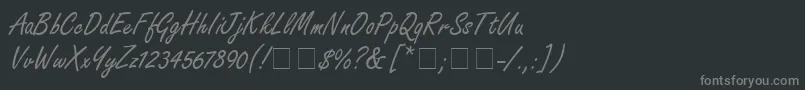 NanoScriptSsi-fontti – harmaat kirjasimet mustalla taustalla