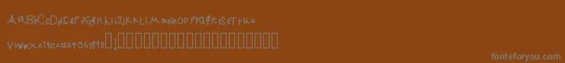 Jekafont Font – Gray Fonts on Brown Background
