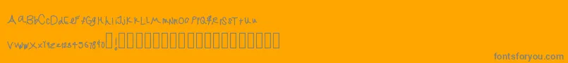 Jekafont-fontti – harmaat kirjasimet oranssilla taustalla