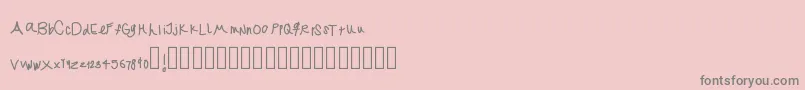 Jekafont-fontti – harmaat kirjasimet vaaleanpunaisella taustalla