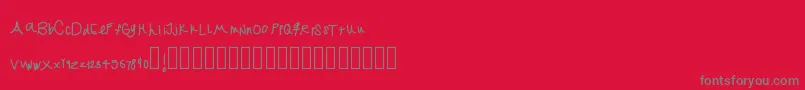 Jekafont-fontti – harmaat kirjasimet punaisella taustalla