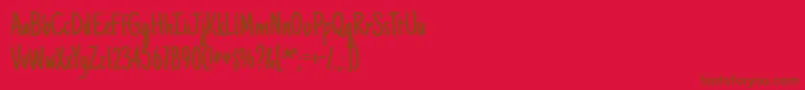 Justanotherhand-Schriftart – Braune Schriften auf rotem Hintergrund