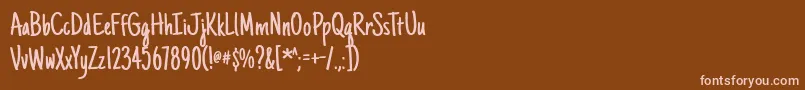 Justanotherhand Font – Pink Fonts on Brown Background
