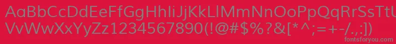 MuliRegular-fontti – harmaat kirjasimet punaisella taustalla