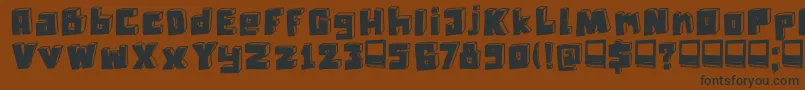 DkTechnojunk-fontti – mustat fontit ruskealla taustalla
