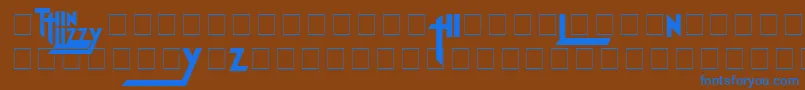 Fonte ThinLizzyJailbreak – fontes azuis em um fundo marrom