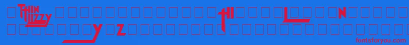 Czcionka ThinLizzyJailbreak – czerwone czcionki na niebieskim tle