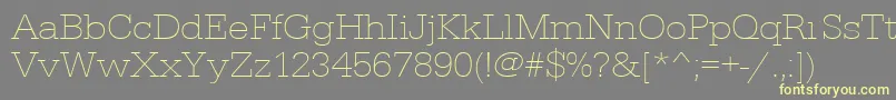 Urwegyptiennetextligextwid Font – Yellow Fonts on Gray Background