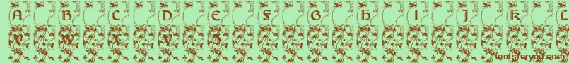 Lisburneinitials Font – Brown Fonts on Green Background