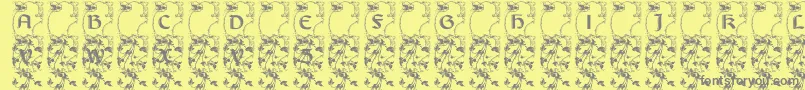 Lisburneinitials Font – Gray Fonts on Yellow Background