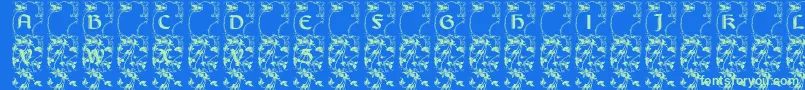 Lisburneinitials-Schriftart – Grüne Schriften auf blauem Hintergrund