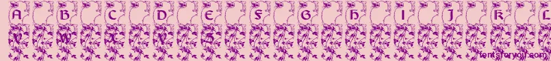フォントLisburneinitials – ピンクの背景に紫のフォント