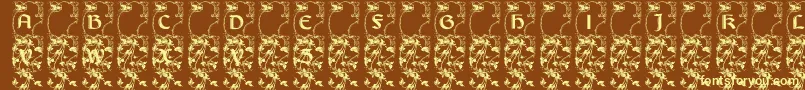 Lisburneinitials-fontti – keltaiset fontit ruskealla taustalla