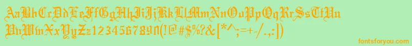 ToccataRegular Font – Orange Fonts on Green Background
